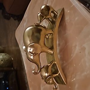 Very eye-catching interior Decor Golden metallic dining decor. 3 elephants.